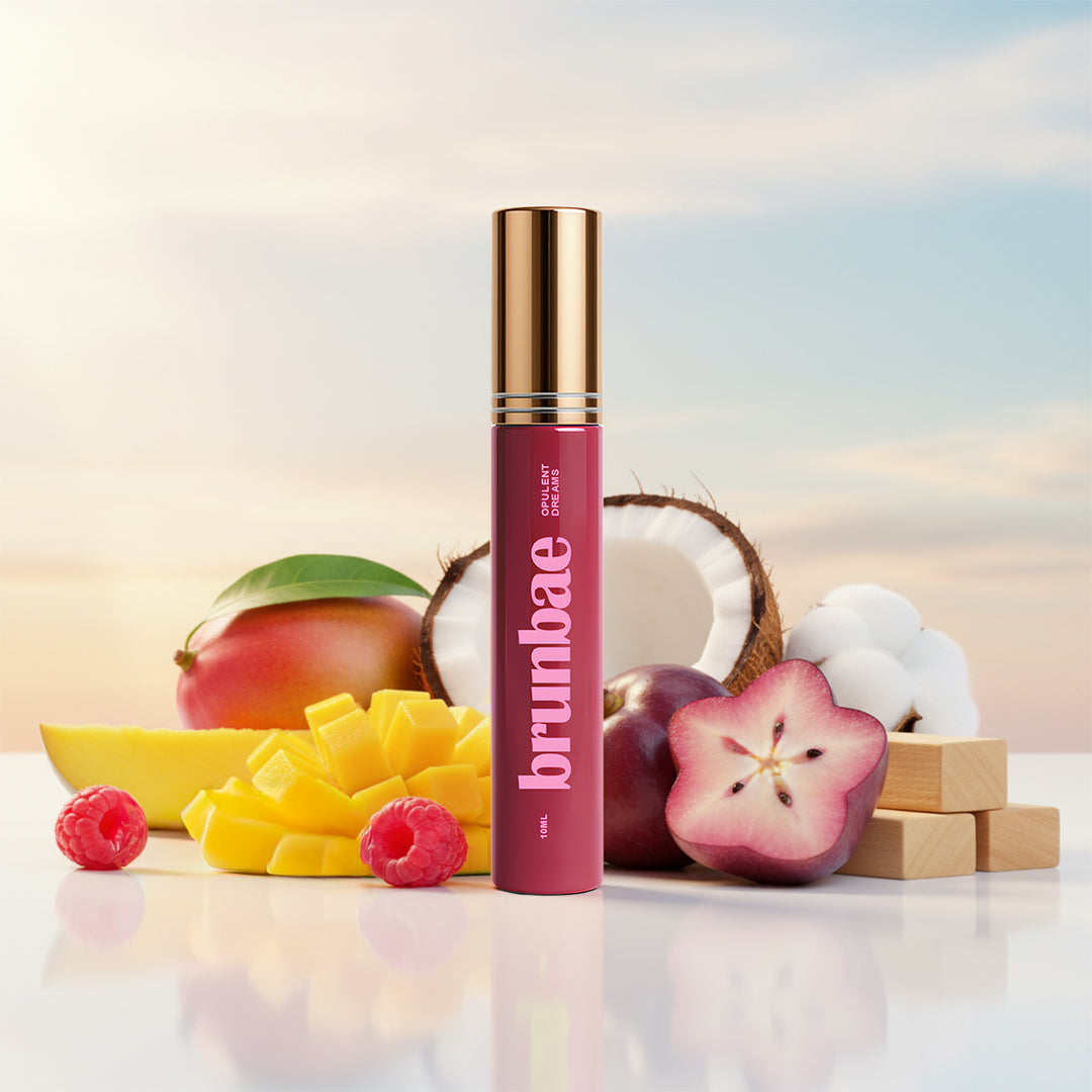 Brunbae Opulent Dreams 10ml Extrait de Parfum for women featuring tropical fruit, mango, coconut and sweet gourmand fragrance notes in a luxury product display.